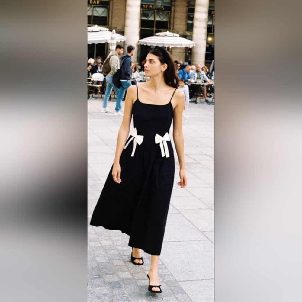 Elegant Black Dress with White Accents